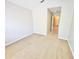 Bedroom featuring neutral walls, plush carpeting, and an open doorway at 7054 Cadiz Blvd, Orlando, FL 32819