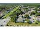 Aerial view of home with well-defined property lines nestled in a lush, green neighborhood at 7201 Halton Ct, Windermere, FL 34786