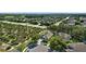 Beautiful aerial view of neighborhood, showcasing lush trees and surrounding area at 7201 Halton Ct, Windermere, FL 34786