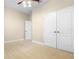 Spacious bedroom with neutral walls, carpet and a ceiling fan plus ample closet space at 7201 Halton Ct, Windermere, FL 34786