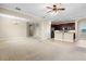 Spacious living room, with views into the kitchen and dining room, perfect for modern living at 7201 Halton Ct, Windermere, FL 34786