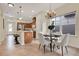 Open dining area with stainless steel appliances and access to the kitchen at 8245 Laureate Blvd, Orlando, FL 32827