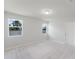 Neutral bedroom featuring bright light and two windows at 856 Teton St, Haines City, FL 33844