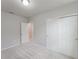 Neutral bedroom featuring a wall closet and light carpet flooring at 856 Teton St, Haines City, FL 33844
