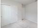 Bedroom featuring white doors and neutral carpeting at 856 Teton St, Haines City, FL 33844