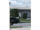 View from window of home exterior and parked car on street at 856 Teton St, Haines City, FL 33844