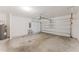 Spacious garage with white walls and concrete flooring at 856 Teton St, Haines City, FL 33844