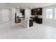 Spacious kitchen with stainless steel appliances and a granite countertop island at 856 Teton St, Haines City, FL 33844