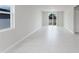 Bright, open living room with tile flooring and sliding glass door at 856 Teton St, Haines City, FL 33844