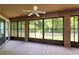 Spacious screened lanai offering peaceful outdoor views and ample room for seating at 9330 Shadow Pinar Ct, Orlando, FL 32825