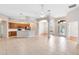Airy open floor plan living space with tile flooring and plenty of sunlight at 9330 Shadow Pinar Ct, Orlando, FL 32825