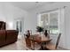 Bright dining area with backyard views at 10125 Sandy Marsh Ln, Orlando, FL 32832