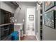 This bathroom features a sink, toilet, and hexagonal shelving for towels and toiletries at 10169 Matchlock Dr, Orlando, FL 32821