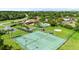 Aerial shot features the tennis courts and community pool at 10169 Matchlock Dr, Orlando, FL 32821