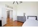 Bedroom features wood floors, an open doorway and plenty of space at 1034 Alvina Ln, Oviedo, FL 32765