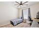 Bedroom featuring carpet floors, a window and a ceiling fan at 1034 Alvina Ln, Oviedo, FL 32765