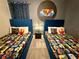 Comfortable bedroom featuring two beds with Star Wars themed bedding and decor at 1077 Leader St, Davenport, FL 33896