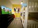 This bedroom is themed with a Mickey Mouse motif and features a bunk bed at 1077 Leader St, Davenport, FL 33896