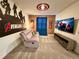 This bedroom features a decorative brick wall and Avengers decor at 1077 Leader St, Davenport, FL 33896