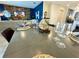Elegant dining area with a decorative table setting and a view of the living room at 1077 Leader St, Davenport, FL 33896
