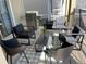Outdoor patio with comfortable seating, grill, and view of the backyard at 1077 Leader St, Davenport, FL 33896