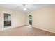 Cozy bedroom featuring natural light and neutral walls and carpet at 11 Huntley Ct, Haines City, FL 33844