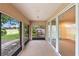 Screened patio with expansive views of the backyard at 11 Huntley Ct, Haines City, FL 33844