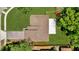 Aerial view of the home showing roof, yard, patio, and driveway at 1301 Paradise Ln, Winter Park, FL 32792