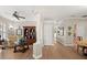 Open-concept living space with hardwood floors, neutral colors, and natural light at 141 Dommerich Dr, Maitland, FL 32751