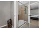 Bathroom featuring a glass-enclosed shower with built-in shelving at 14537 San Lorenzo Dr, Orlando, FL 32820