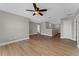 Loft area with wood flooring, neutral paint, and lots of natural light at 14537 San Lorenzo Dr, Orlando, FL 32820