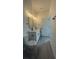 Well-lit bathroom with double vanity, framed mirrors, modern fixtures, and wood-look flooring at 16734 Sw 18Th Avenue Rd, Ocala, FL 34473