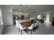 Spacious kitchen with white cabinets, stainless steel appliances, a center island, and great natural light at 16734 Sw 18Th Avenue Rd, Ocala, FL 34473