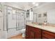 Bright bathroom featuring a shower-tub combination, granite countertops, and recessed lighting at 1855 Vista Royale Blvd, Orlando, FL 32835