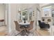 Bright breakfast nook with a bay window offering views of the backyard and pool at 1855 Vista Royale Blvd, Orlando, FL 32835