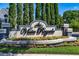 Attractive Vista Royale entrance sign with colorful landscaping and decorative lighting at 1855 Vista Royale Blvd, Orlando, FL 32835