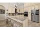 Modern kitchen boasting granite countertops and stainless steel appliances at 1855 Vista Royale Blvd, Orlando, FL 32835