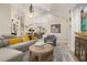 Spacious living room showcasing stylish decor and seamless flow into the dining area at 1855 Vista Royale Blvd, Orlando, FL 32835