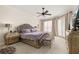 Serene bedroom with a plush bed, elegant furnishings, and soft natural light at 1855 Vista Royale Blvd, Orlando, FL 32835