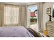 Bedroom view through open doorway reveals pool beyond at 1855 Vista Royale Blvd, Orlando, FL 32835