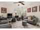 Well-lit home office with a desk, a comfortable sofa, and tasteful decor at 1855 Vista Royale Blvd, Orlando, FL 32835