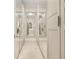 Spacious walk-in closet with mirrored doors and ample storage space at 1855 Vista Royale Blvd, Orlando, FL 32835