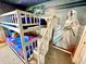 Stylish ' bedroom showcasing bunk beds with fun 'Star Wars' themed wall decor at 2034 Fleming Mist Pl, Kissimmee, FL 34747