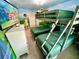 Charming ' bedroom featuring a unique bunk bed with a 'Encanto' theme and decor at 2034 Fleming Mist Pl, Kissimmee, FL 34747