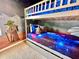 Fun ' bedroom featuring bunk beds and 'Star Wars' themed wall art, carpeted floors at 2034 Fleming Mist Pl, Kissimmee, FL 34747