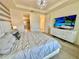 Comfortable main bedroom with a large dresser and an en-suite bathroom at 2034 Fleming Mist Pl, Kissimmee, FL 34747