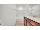 Bathroom with modern vanity, quartz countertop, and a shower-tub combo at 2203 Bluebird Pl, St Cloud, FL 34771