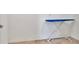 Laundry room featuring an ironing board and neutral wall paint color at 2203 Bluebird Pl, St Cloud, FL 34771