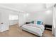 Bright bedroom with neutral color scheme and modern finishes, featuring wood floors at 2294 Gold Dust Dr, Minneola, FL 34715