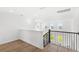 Second floor loft area with plenty of natural light and views of the outdoors at 2294 Gold Dust Dr, Minneola, FL 34715